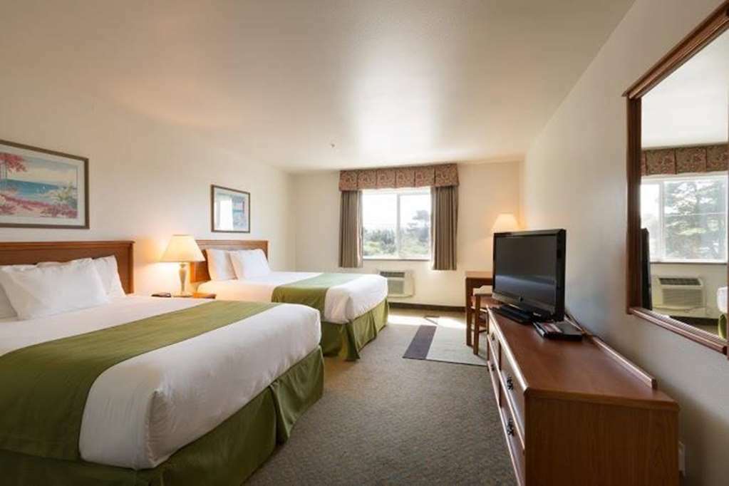 Paradise Inn & Suites At Lincoln City Habitación foto